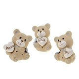 Orso LED in resina e porcellana Etm: bomboniera nascita maschietto elegante e luminosa. Disponibile in 3 varianti, contatta prima.